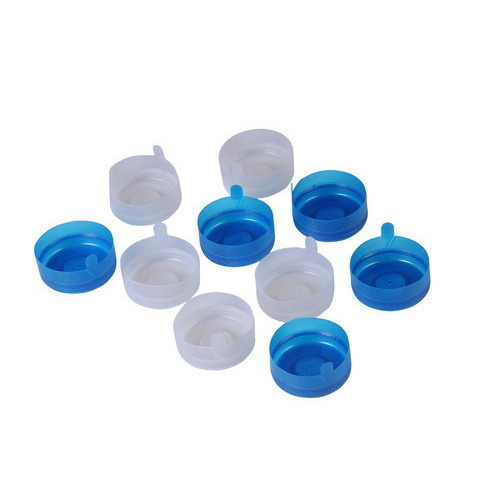 Round White And Blue Plastic Bottle Cap