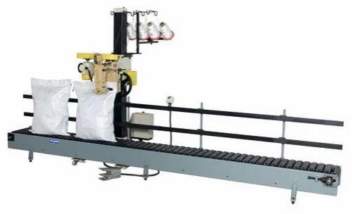 Outfeed Slat Conveyor With Stitching Head